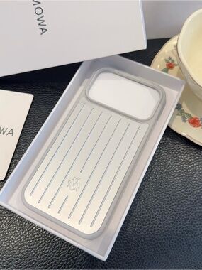 RIMOWA Silver and Light Gray Ribbed Phone Case iPhone 17 pro max